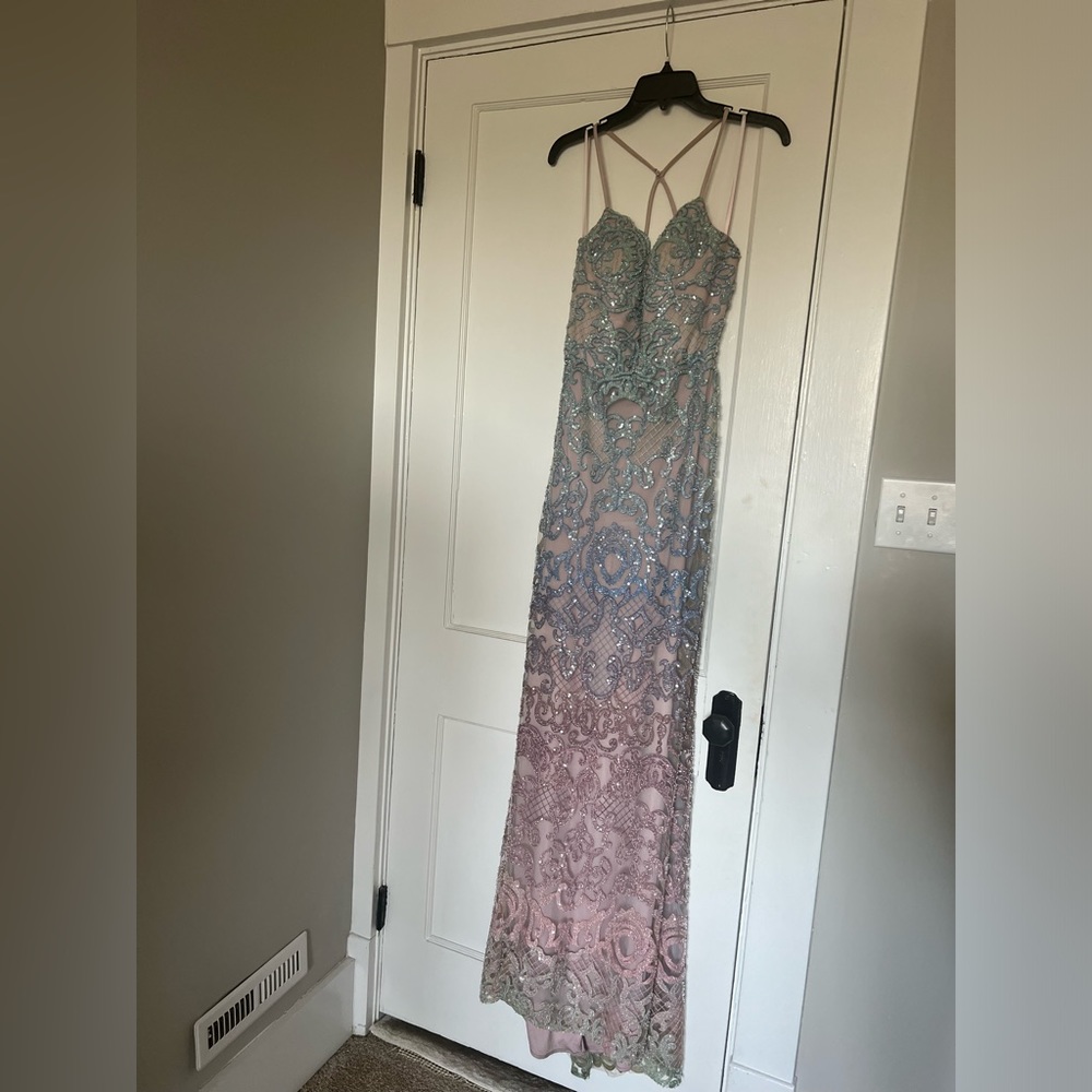 La Femme ombre floor length handbeaded gown.